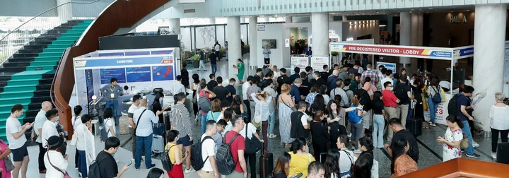 Visitors gathering at VIFA EXPO registration counters